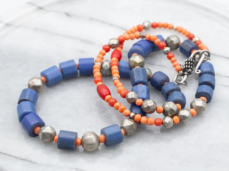 Overhand knot necklaces-Mixed Era Blue Glass, Coral, Sterling Silver African Trade Beaded Necklace