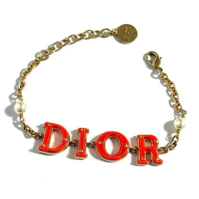 Fine filigree bangles-Christian Dior Artificial ivory Metal Charm Bracelet (Pre-Owned)