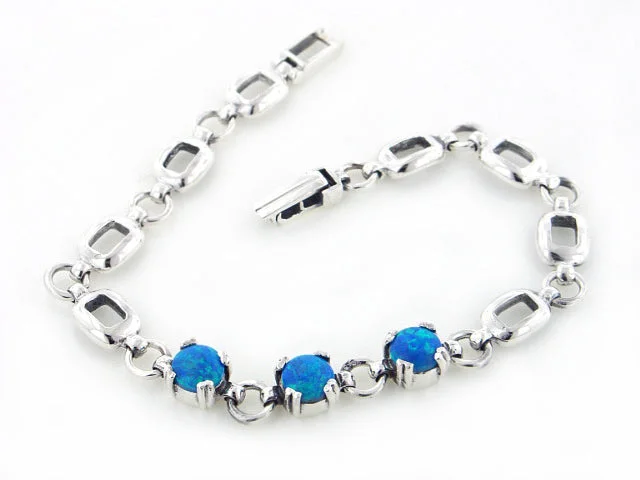 Chiseled initial bangles-Sterling Silver 3-Stone Simulated Blue Opal Link Bracelet 7"