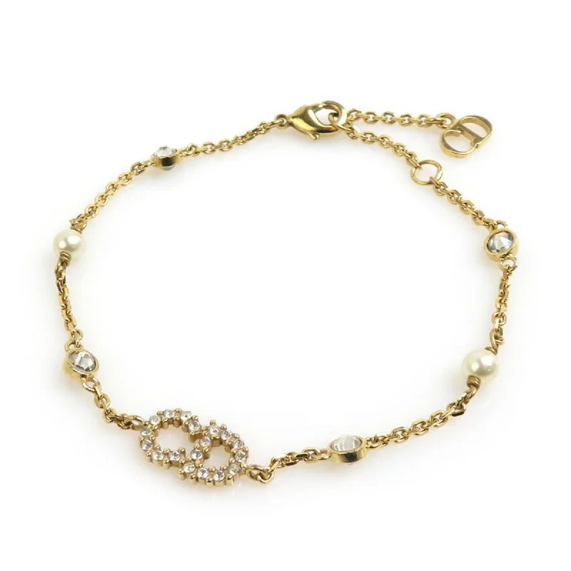 Aged flair bracelets-Christian Dior gold Metal Charm Bracelet (Pre-Owned)